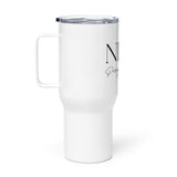 Nine Design+Homes travel mug with a handle